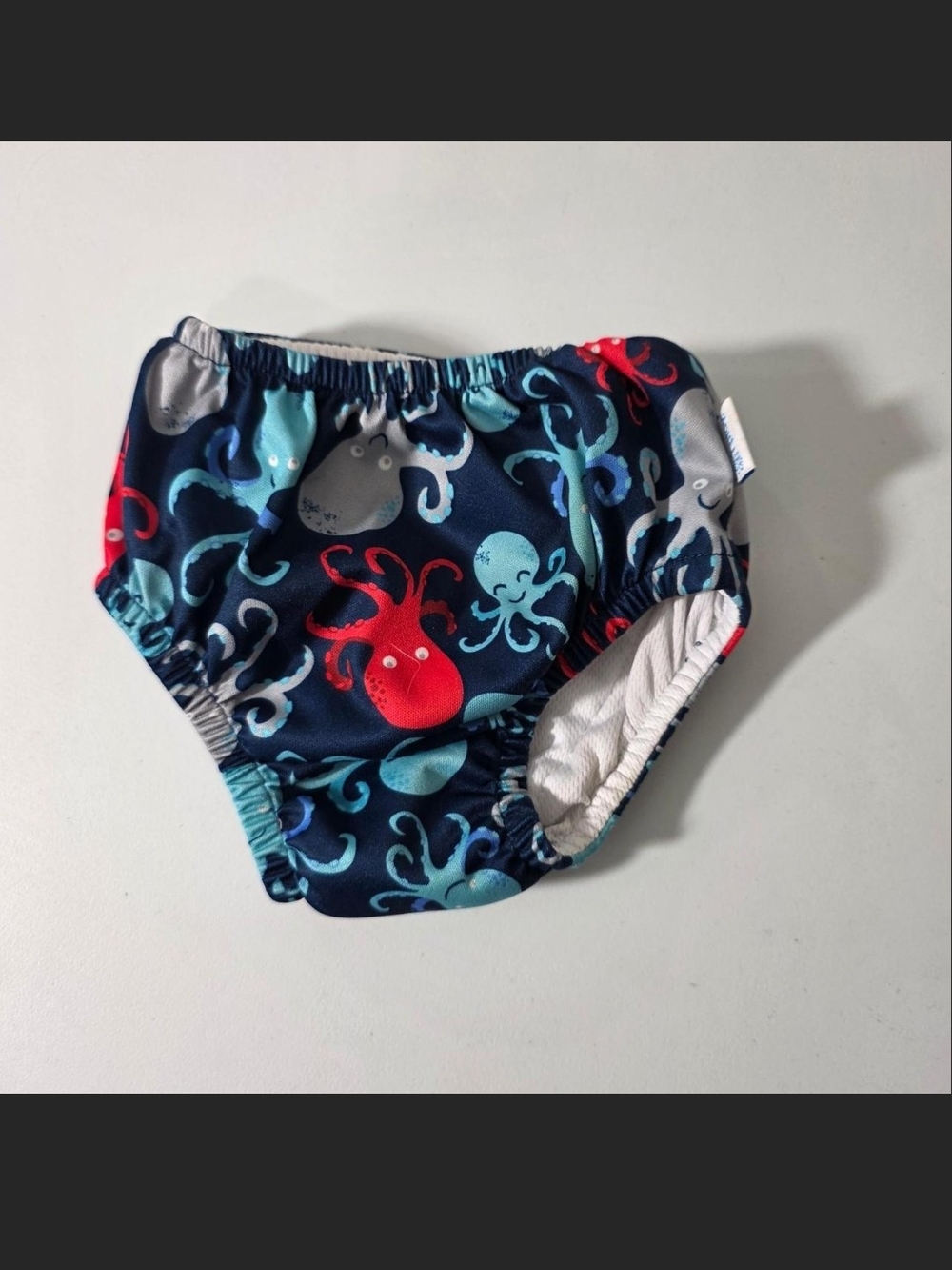 i play. Navy Swim Diaper Cover with Red & Aqua Octopus Print